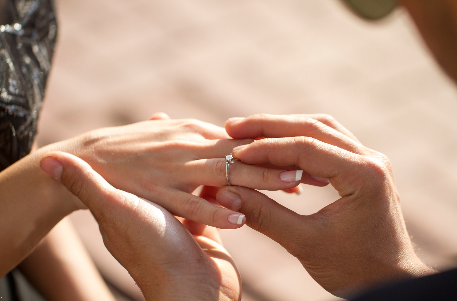 Man giving a jewelry to a woman